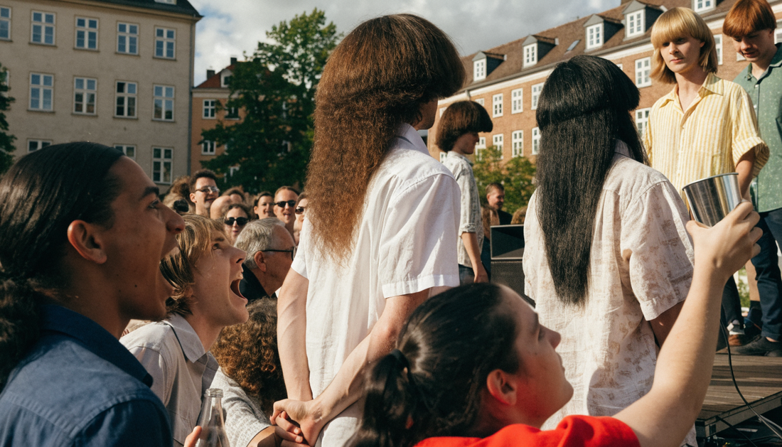 Crowd at a mullet contest in Copenhagen (AI-generated illustration)