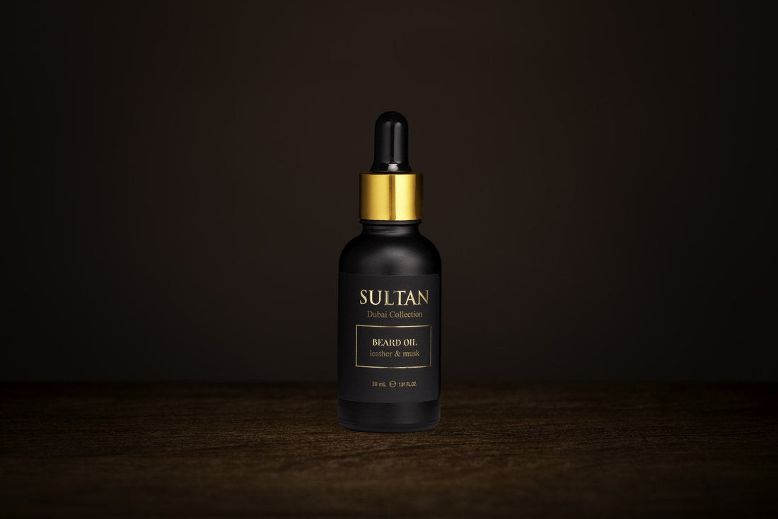 Sultan Beard Oil 30 ml in a black bottle with a gold dropper against a dark background.