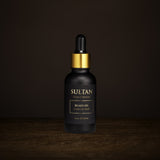 Sultan Beard Oil 30 ml in a matte black dropper bottle with gold collar, leather and musk scent